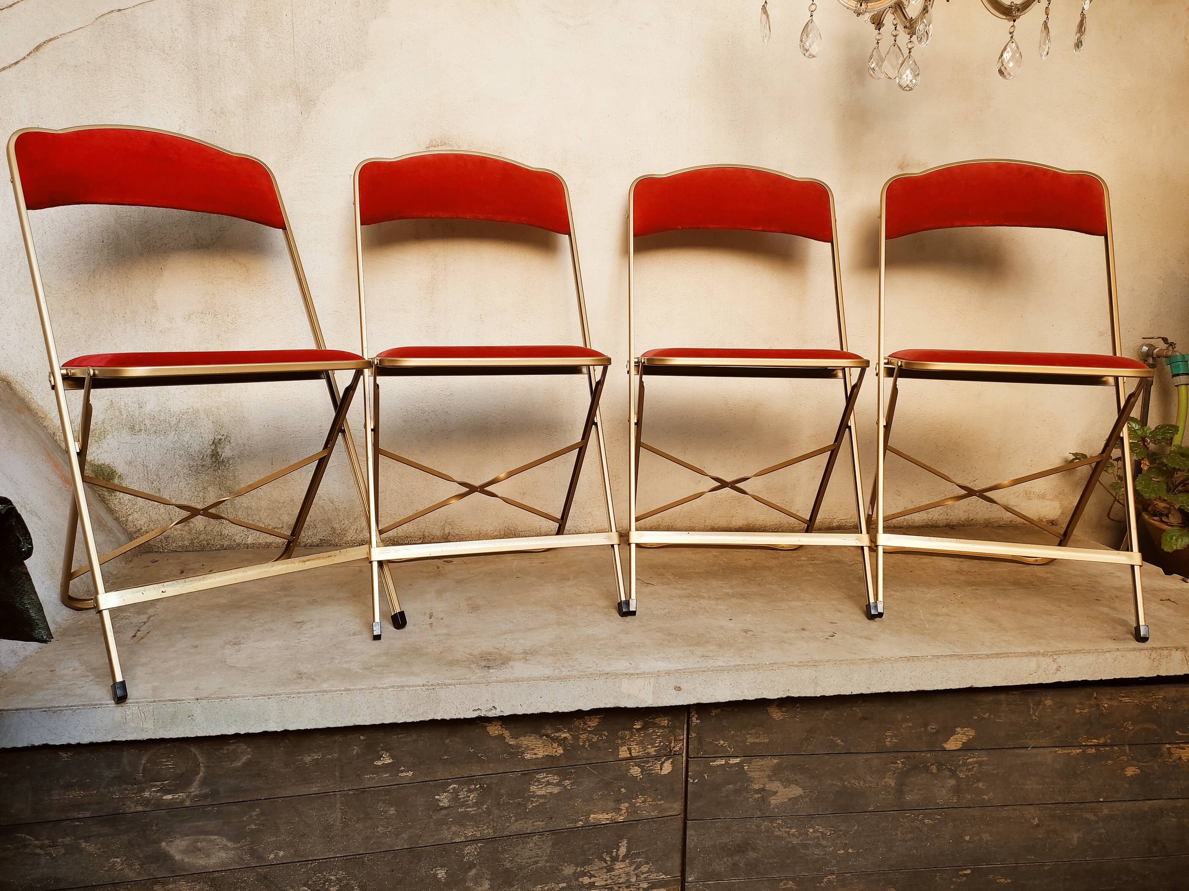 4 golden foldable chairs in scarlet velvet