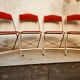 4 golden foldable chairs in scarlet velvet