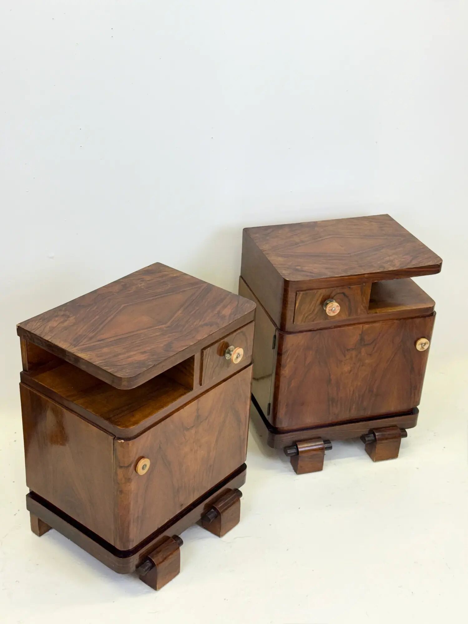 Pair of Art Deco bedside tables in walnut — Italy, 1930-1940