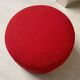 Bathroom toilet with a 70s pouf.