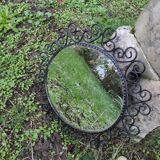 Mirror surrounded by black metal