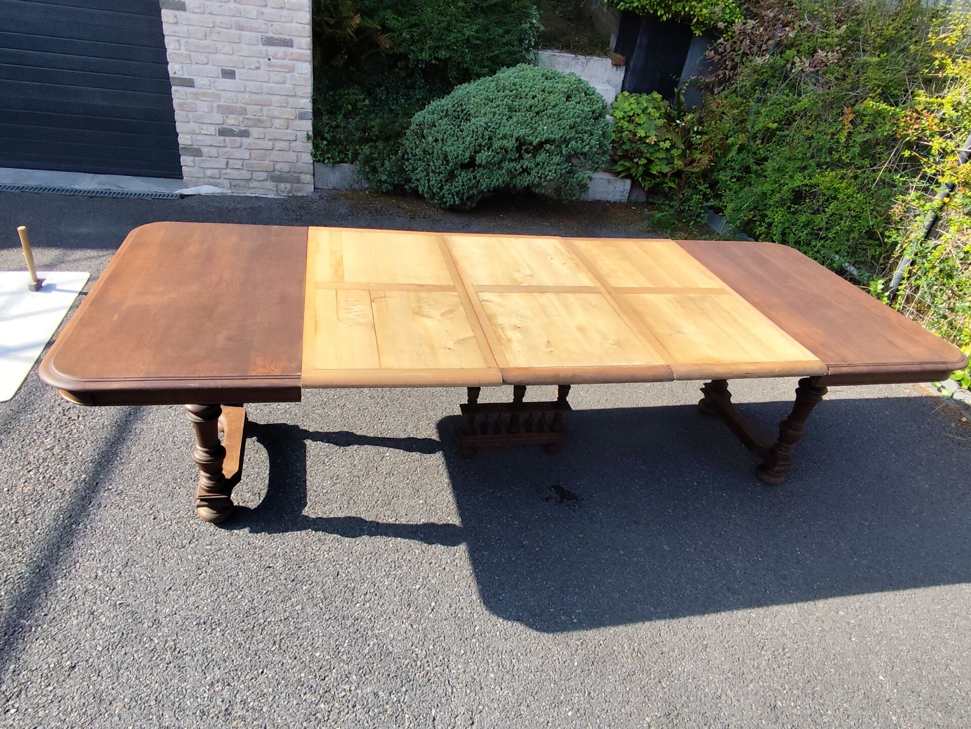 Square wooden table in Henri II style.