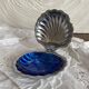 Shell-shaped butter dish in stainless steel and glass