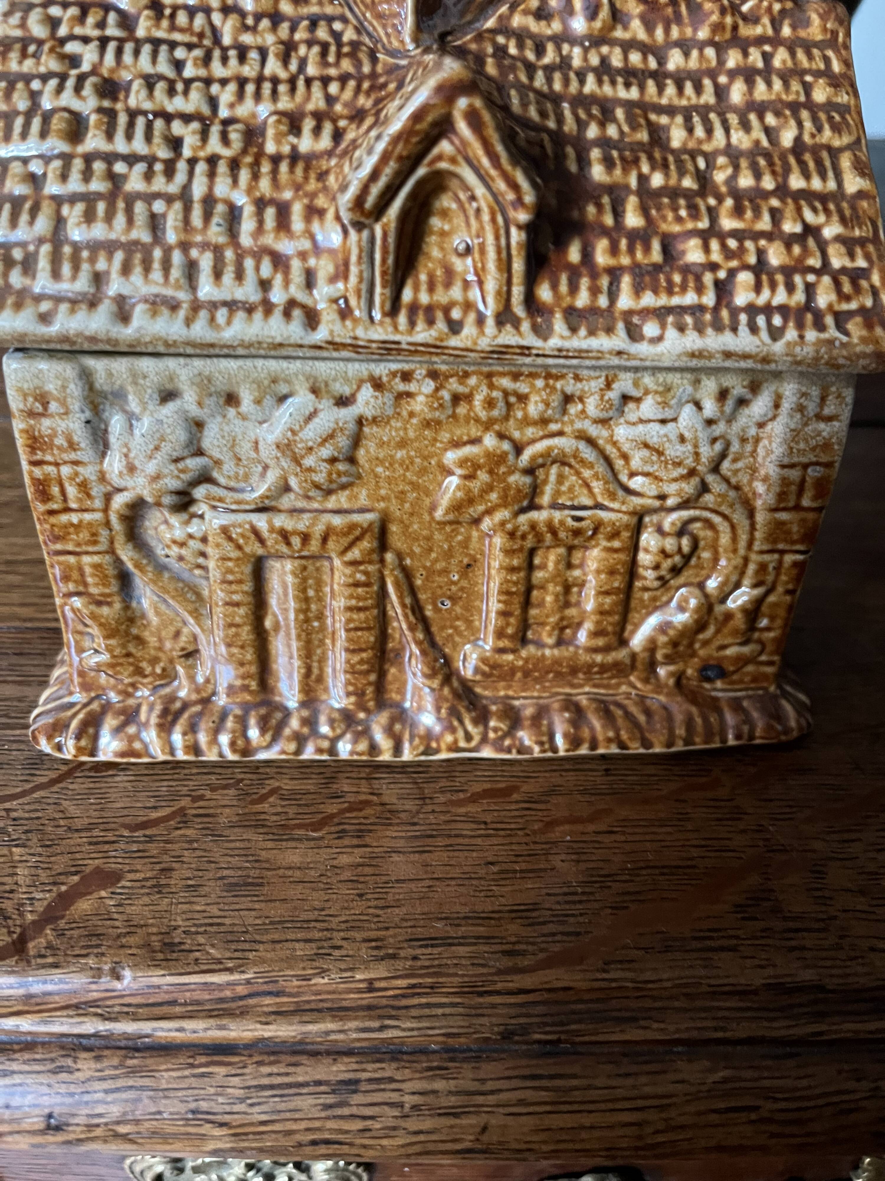 Brown salt-glazed stoneware tobacco pot with candle holder, 1840/1880