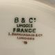 8 flat porcelain plates from Limoges Bernardaud, gilded Greek decoration, twentieth century