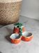 Salt and pepper shakers, mustard pot, slip