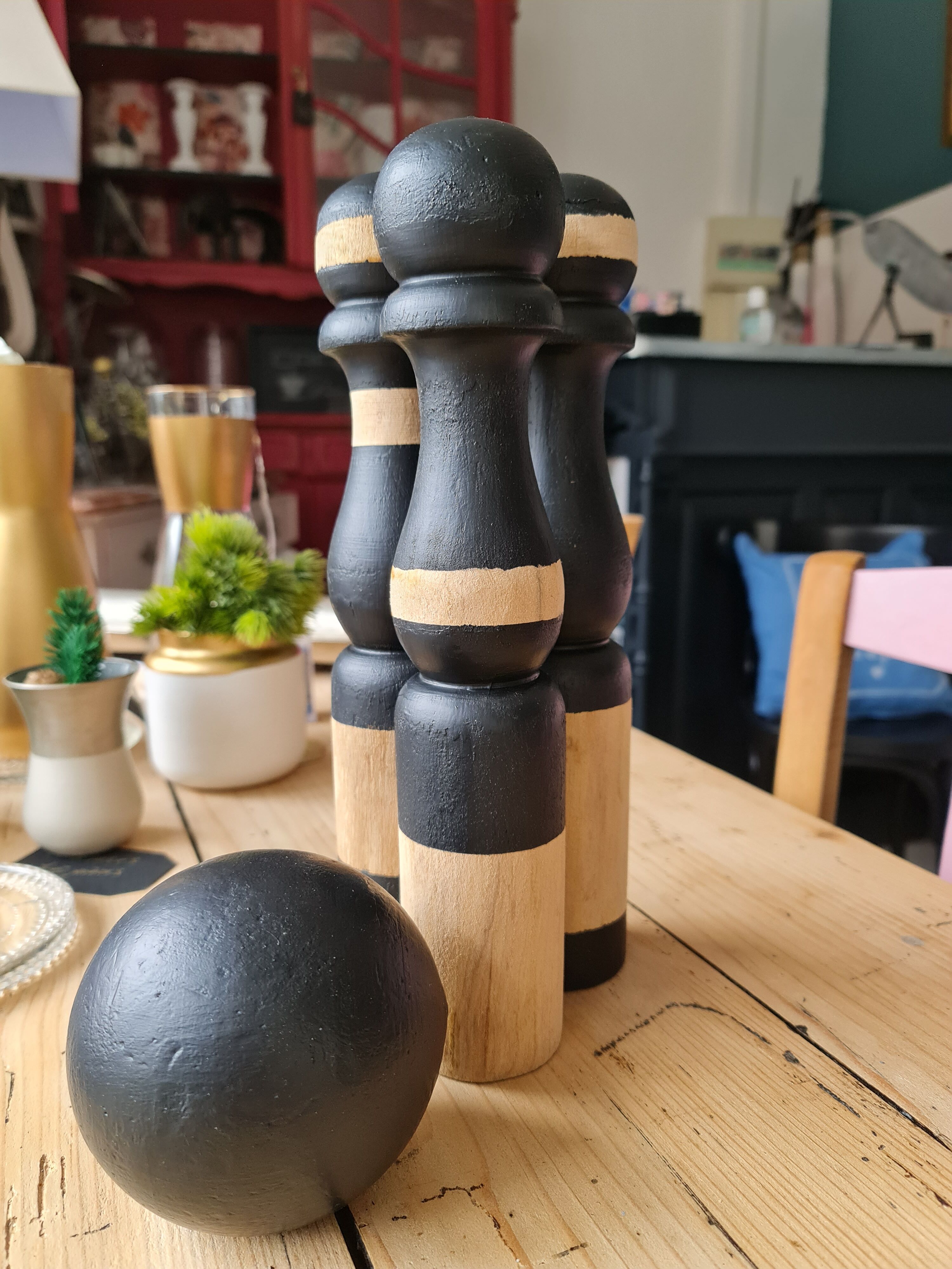 Lot of 3 pins and a black and rough ball