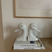 Vintage bookends in the shape of a goose or ceramic duck