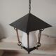 suspension lanterne noire et doré avec opaline blanche