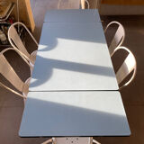 Blue Formica table for 4 to 6 people