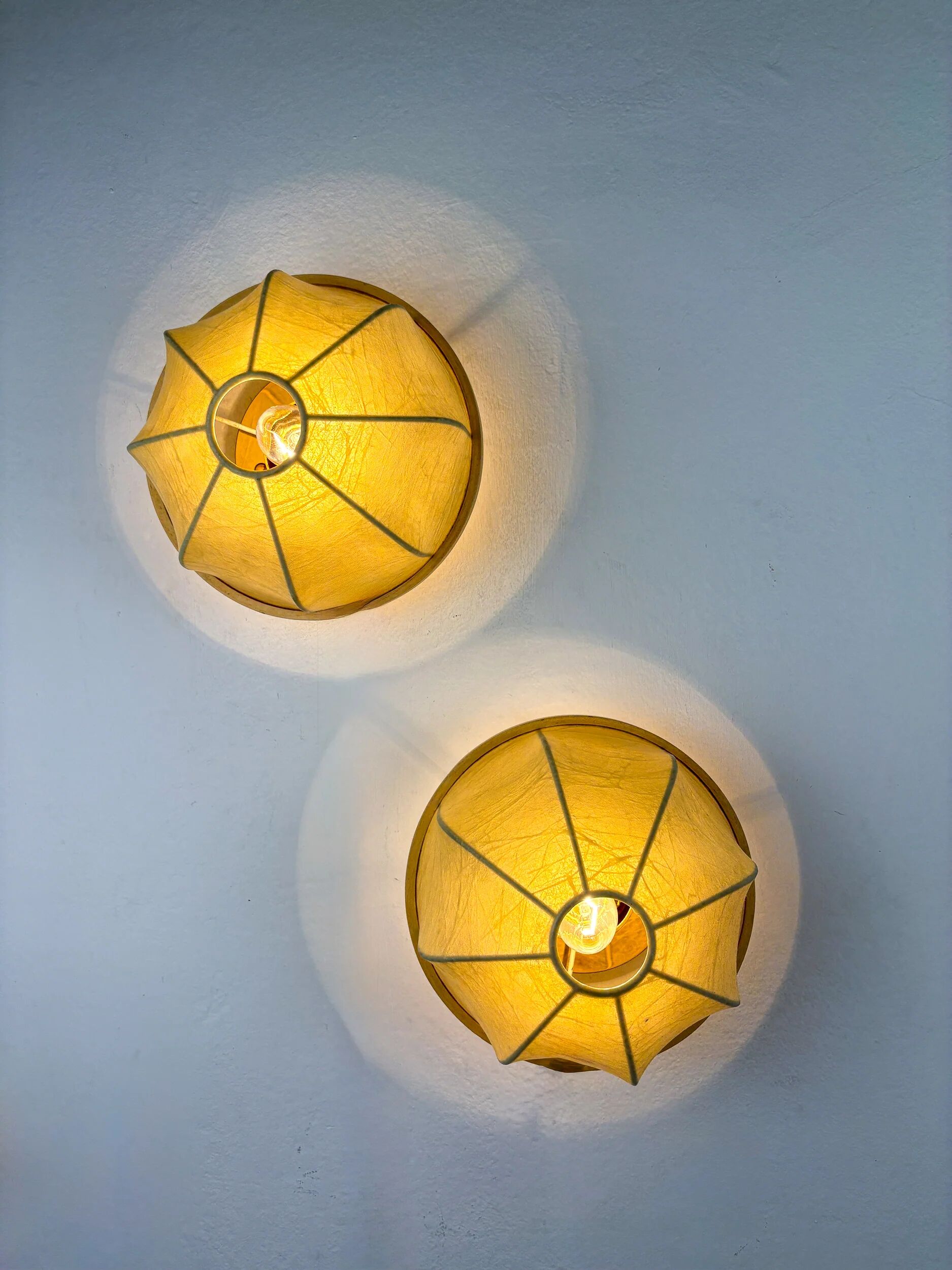 Pair of Italian "Cocoon" wall lights, 1970s
