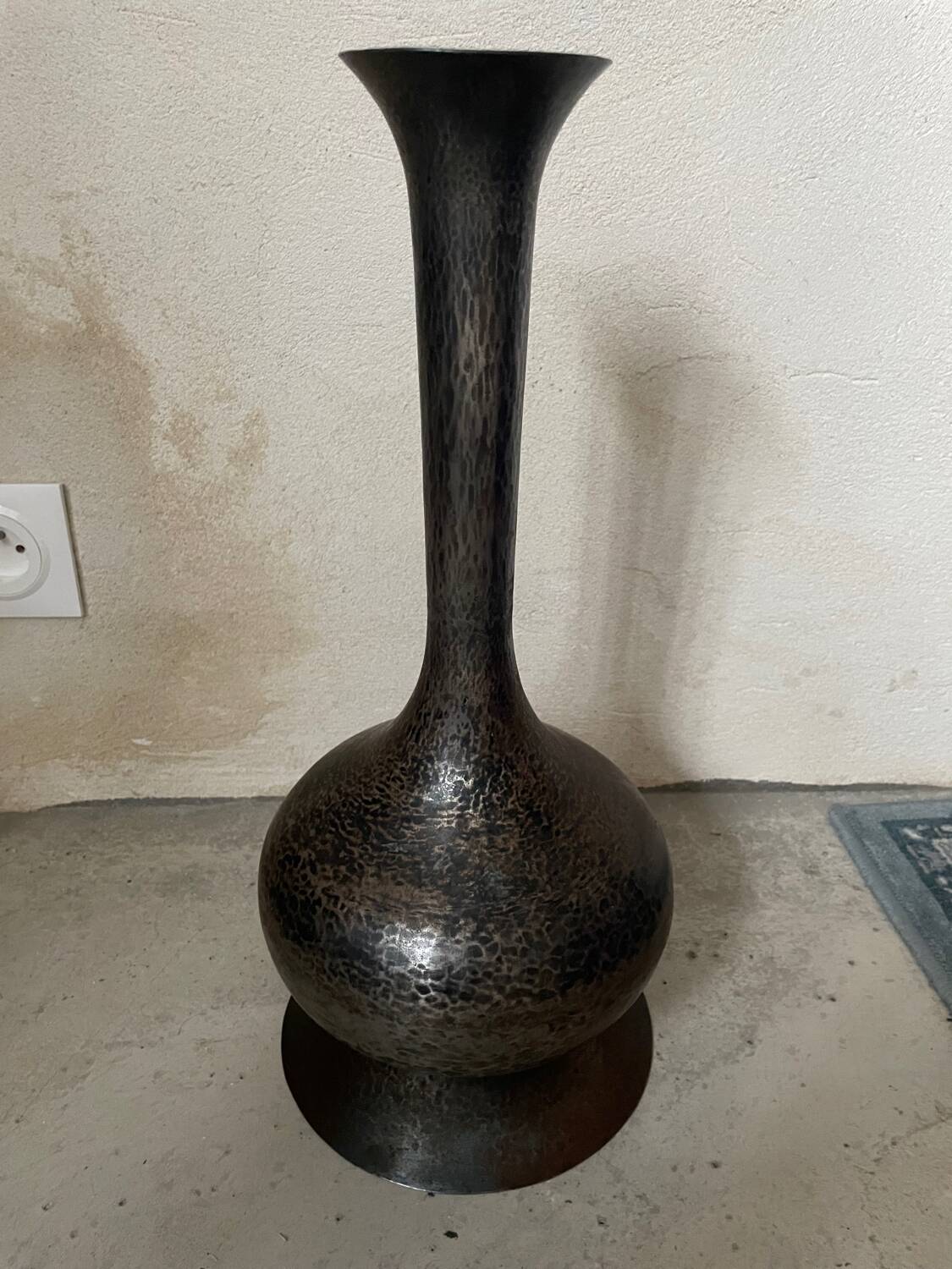 Hammered metal vase