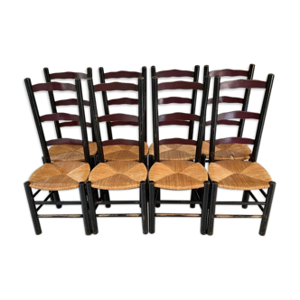 Set of 8 wooden chairs seated straw, black studs beautiful patina