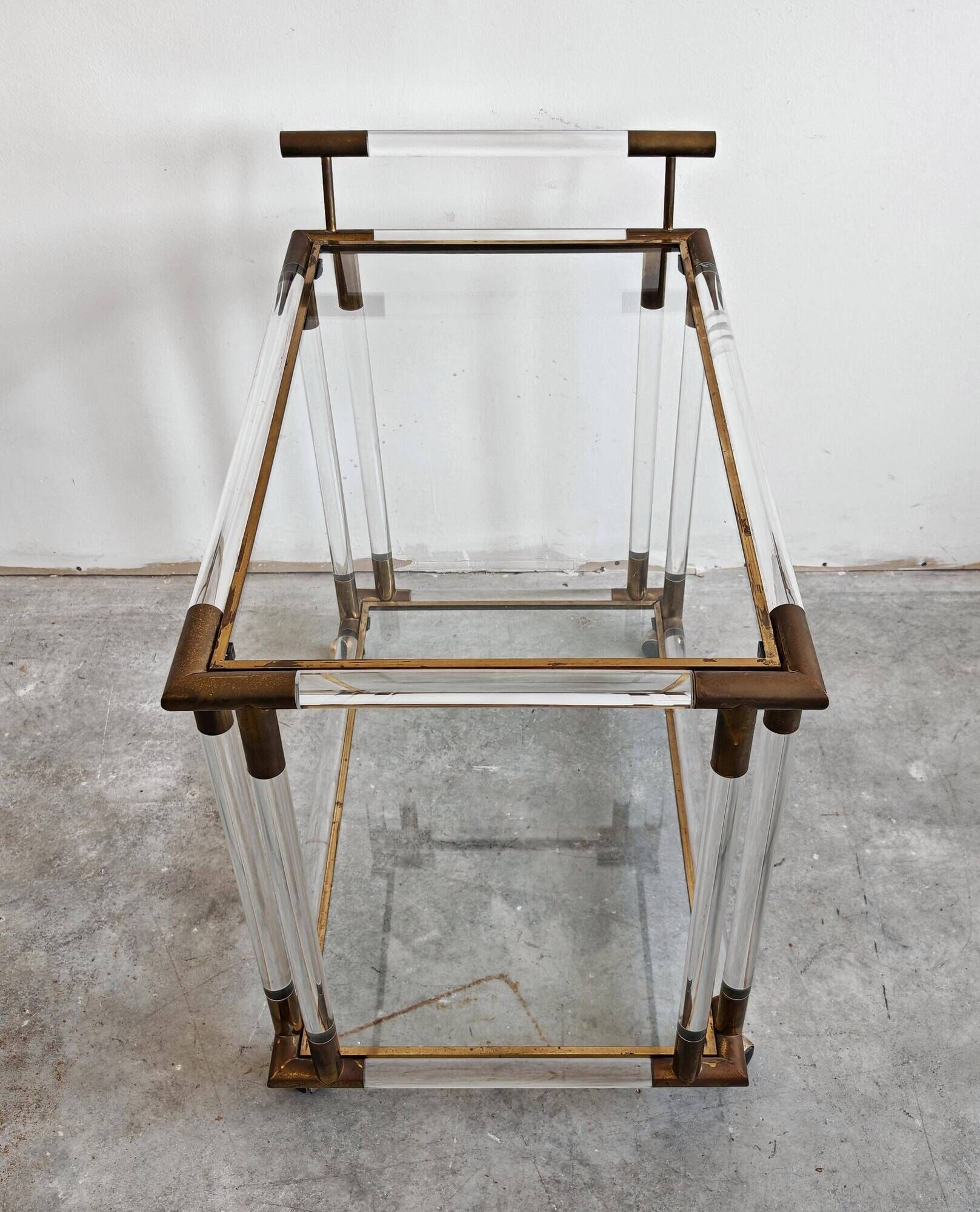 Modern mid-century bar cart in lucite, bronze, and glass, 1970s