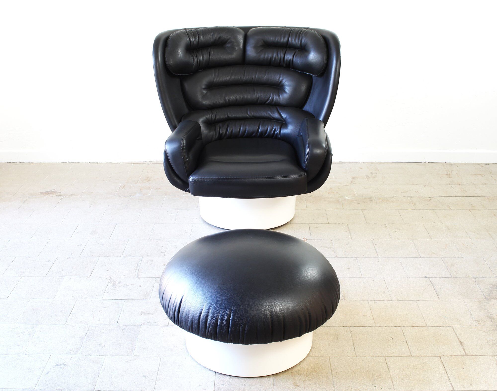 Joe Colombo Elda Chair + Ottoman in Black Leather and White Fiberglass Shell