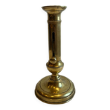 Bougeoir ancien en cuivre à bouton pressoir