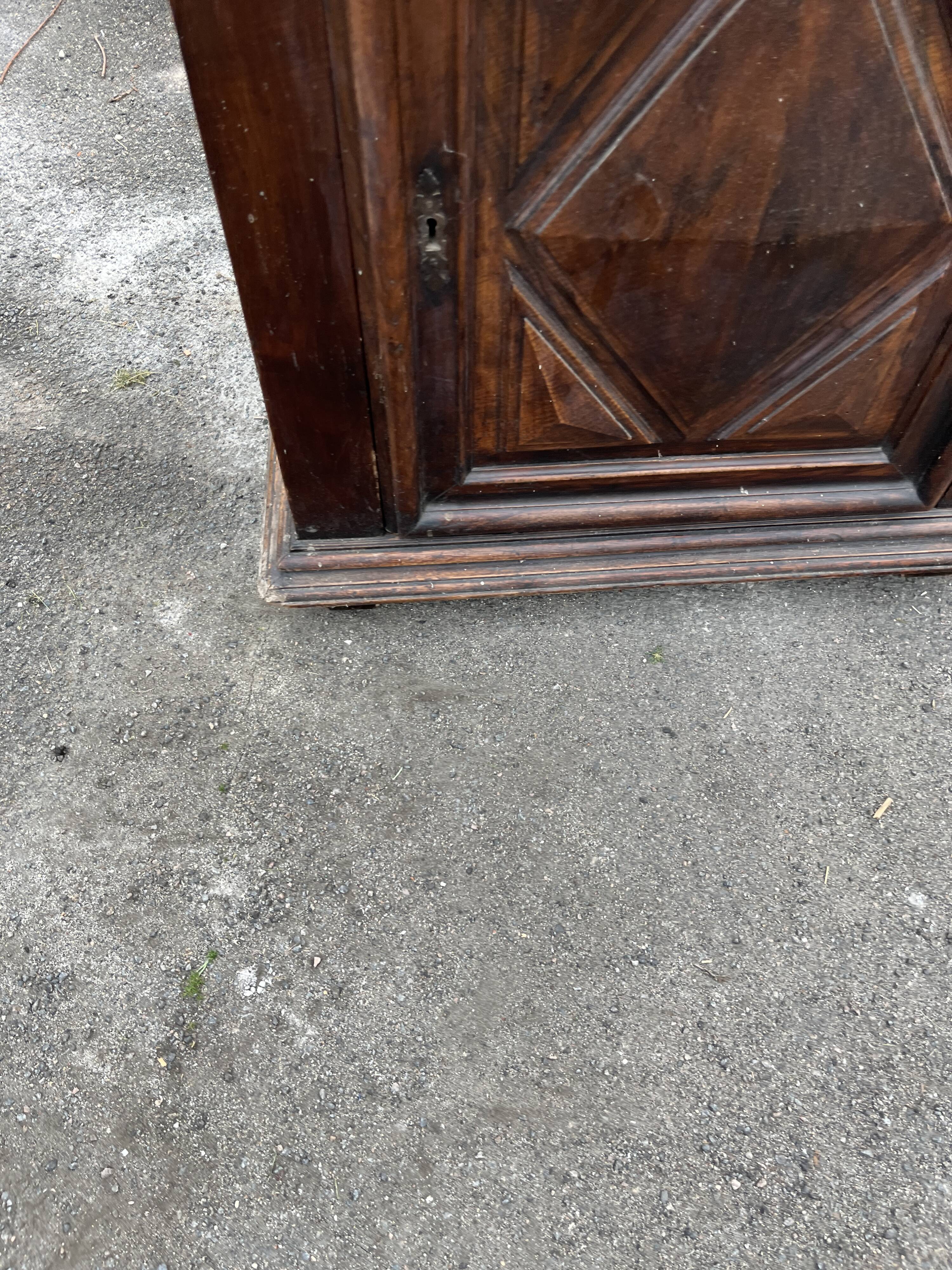 Antique walnut confiturier in Louis XIII style with diamond point panel.