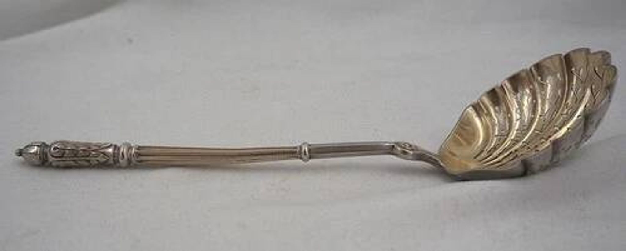 Puiforcat, sugar spoon, solid silver, Russian-style handle, vermeil.