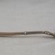 Puiforcat, sugar spoon, solid silver, Russian-style handle, vermeil.