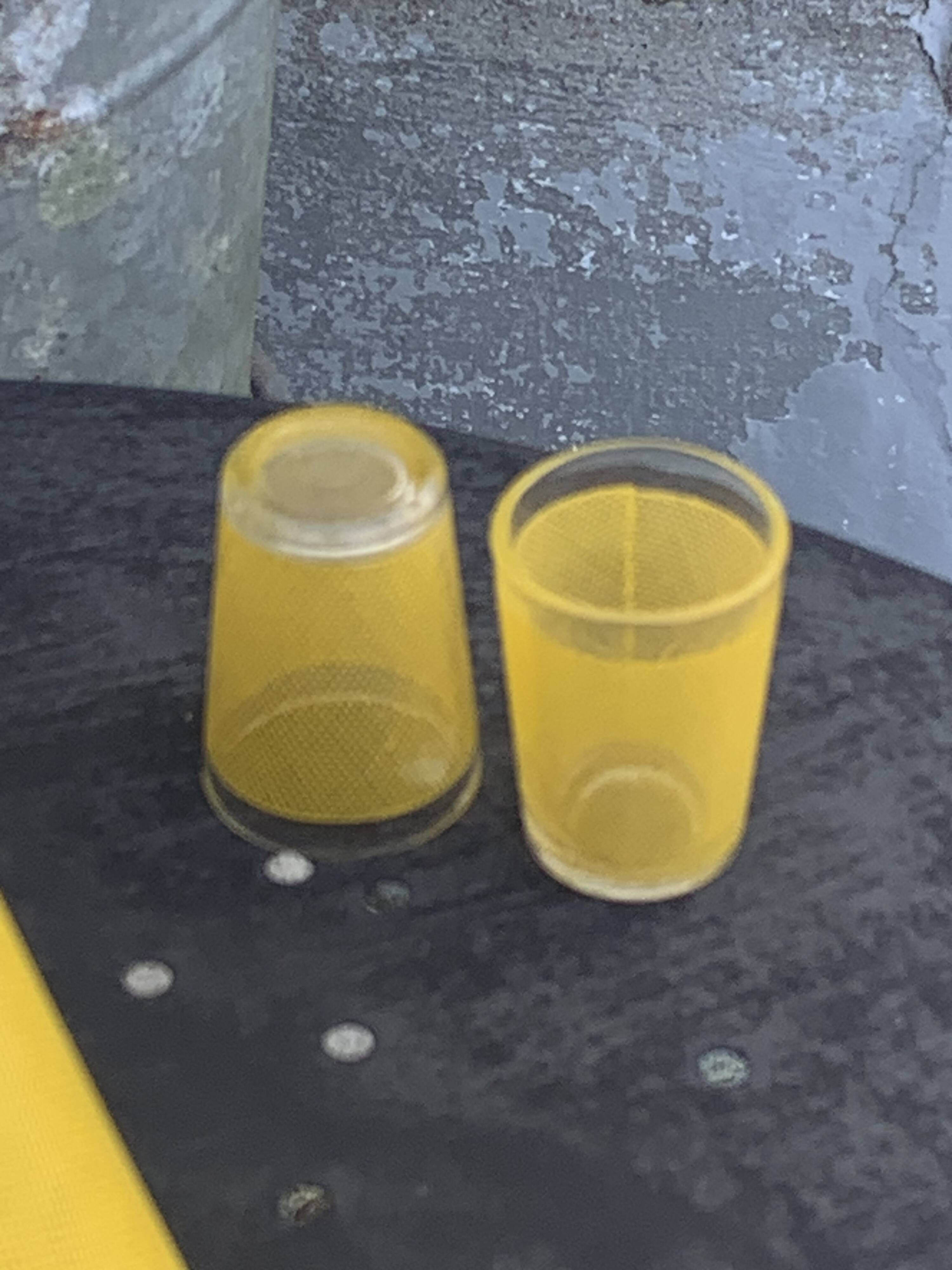 Liqueur service composed of a glass carafe and 8 small yellow screen-printed glasses