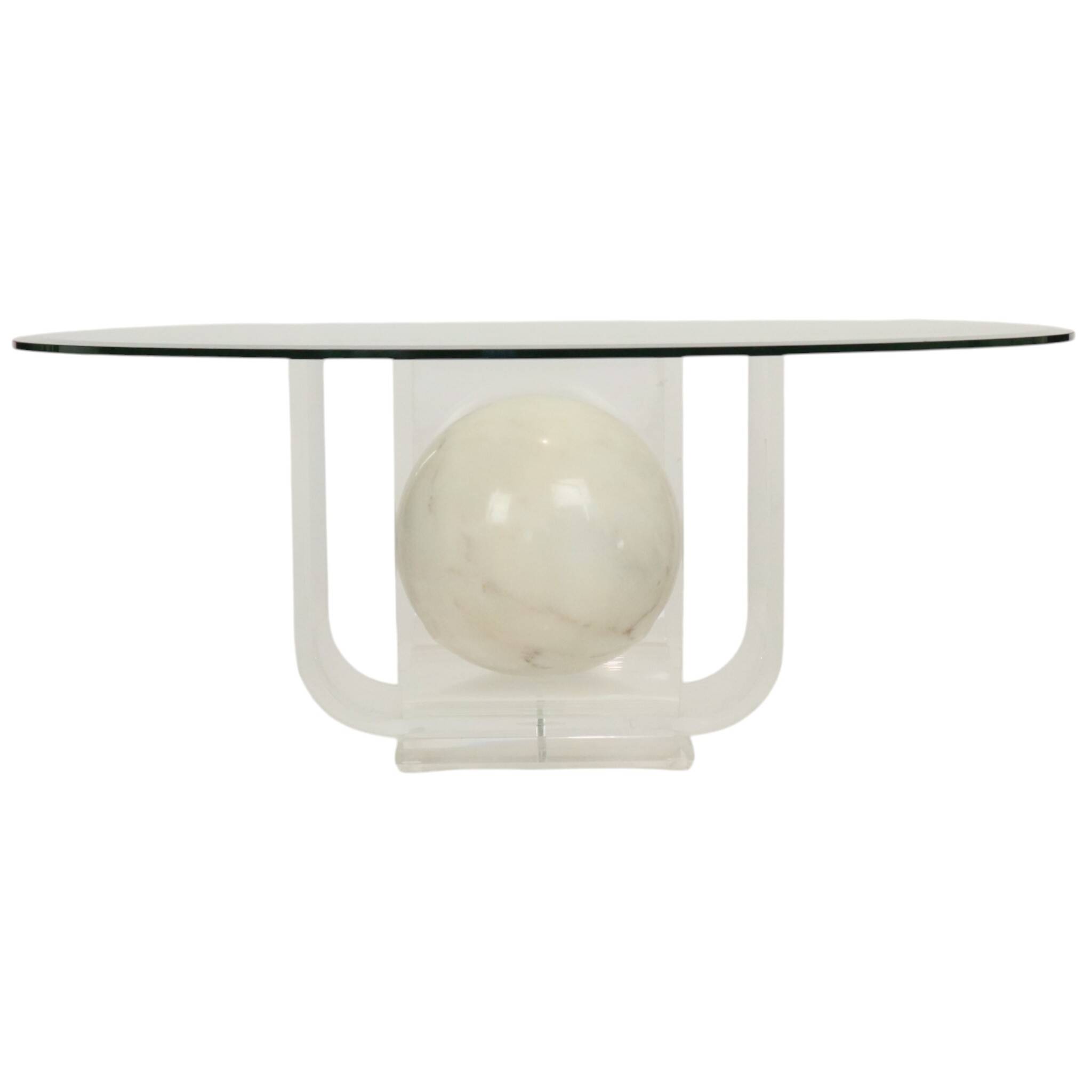 Vintage round coffee table in lucite and marbled glass.