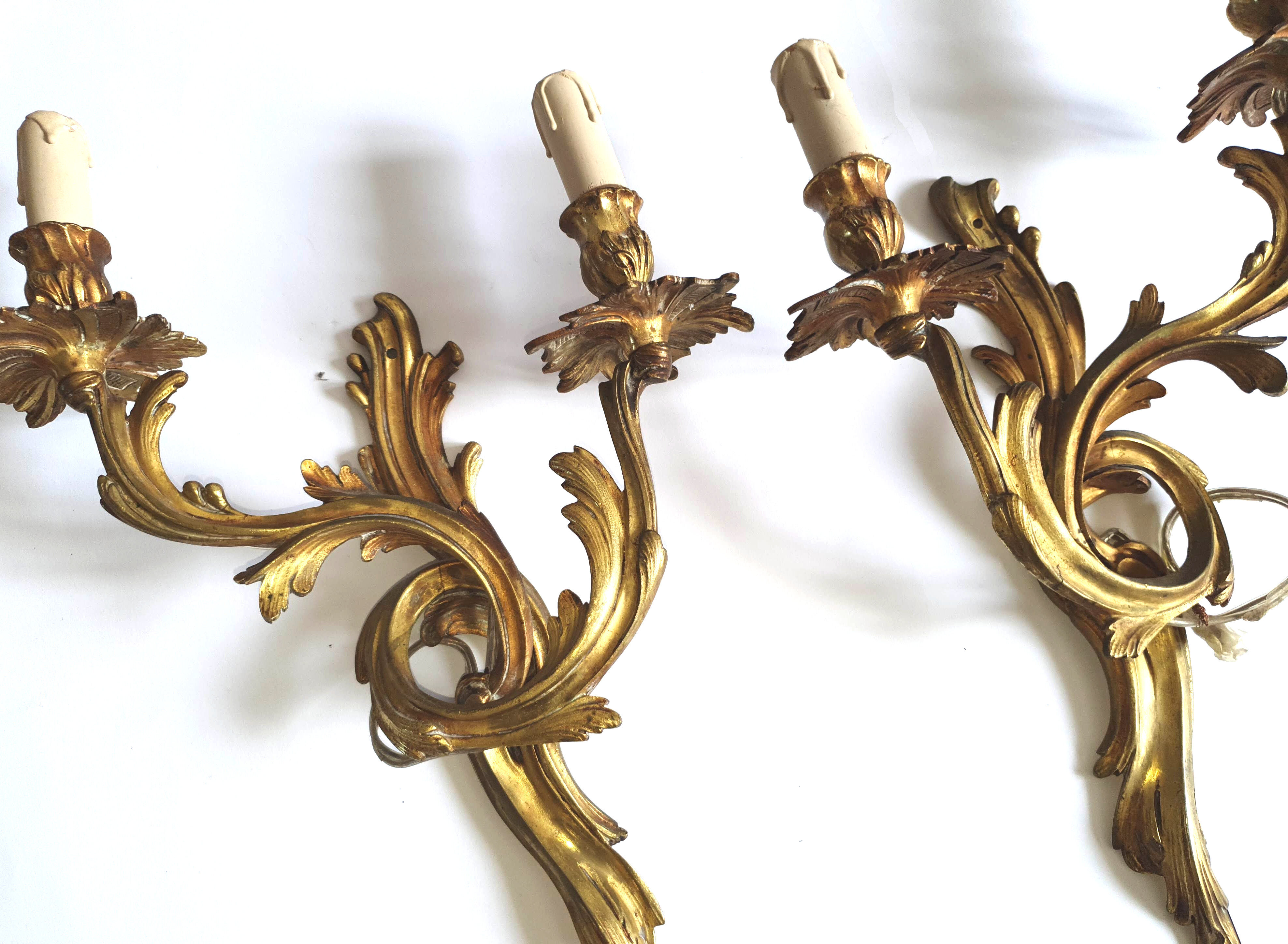 Duo of gilded bronze wall lamps