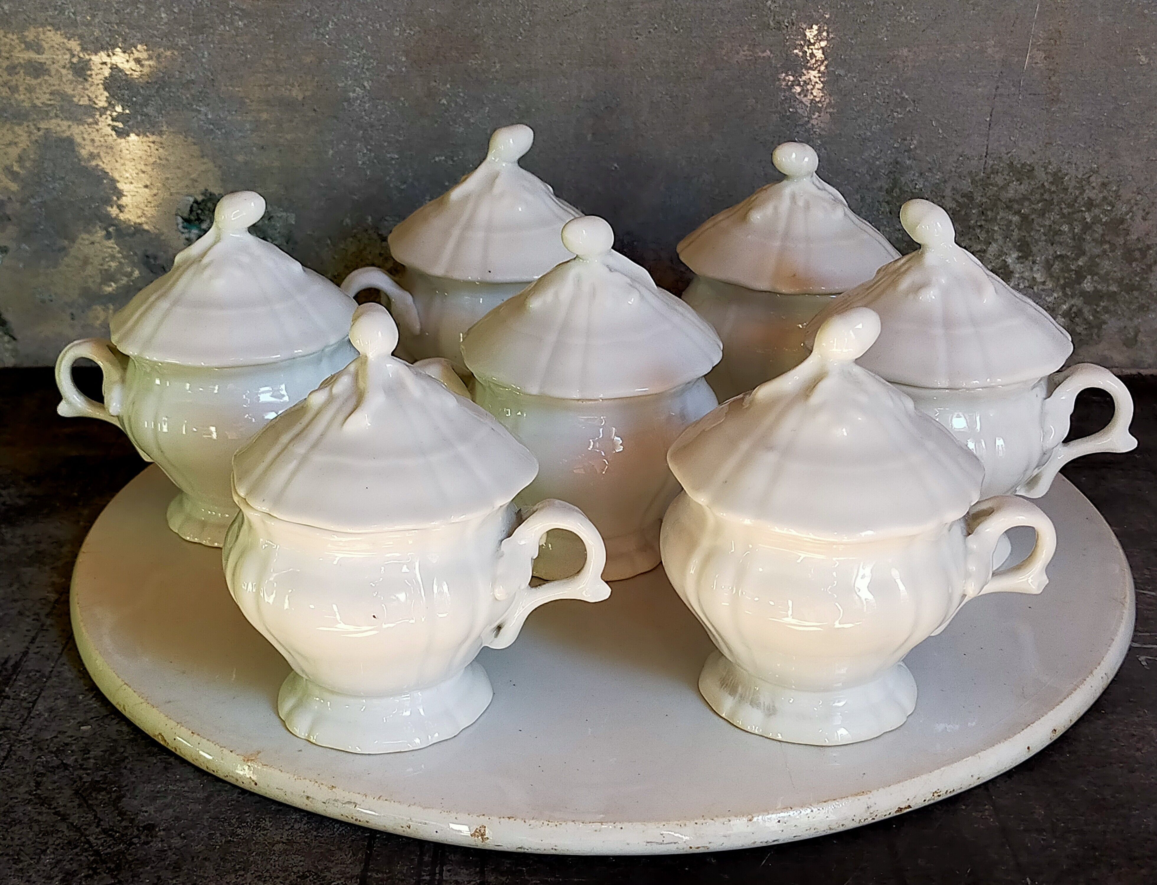 Set of seven covered pots and tray old white slurry nineteenth