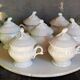 Set of seven covered pots and tray old white slurry nineteenth