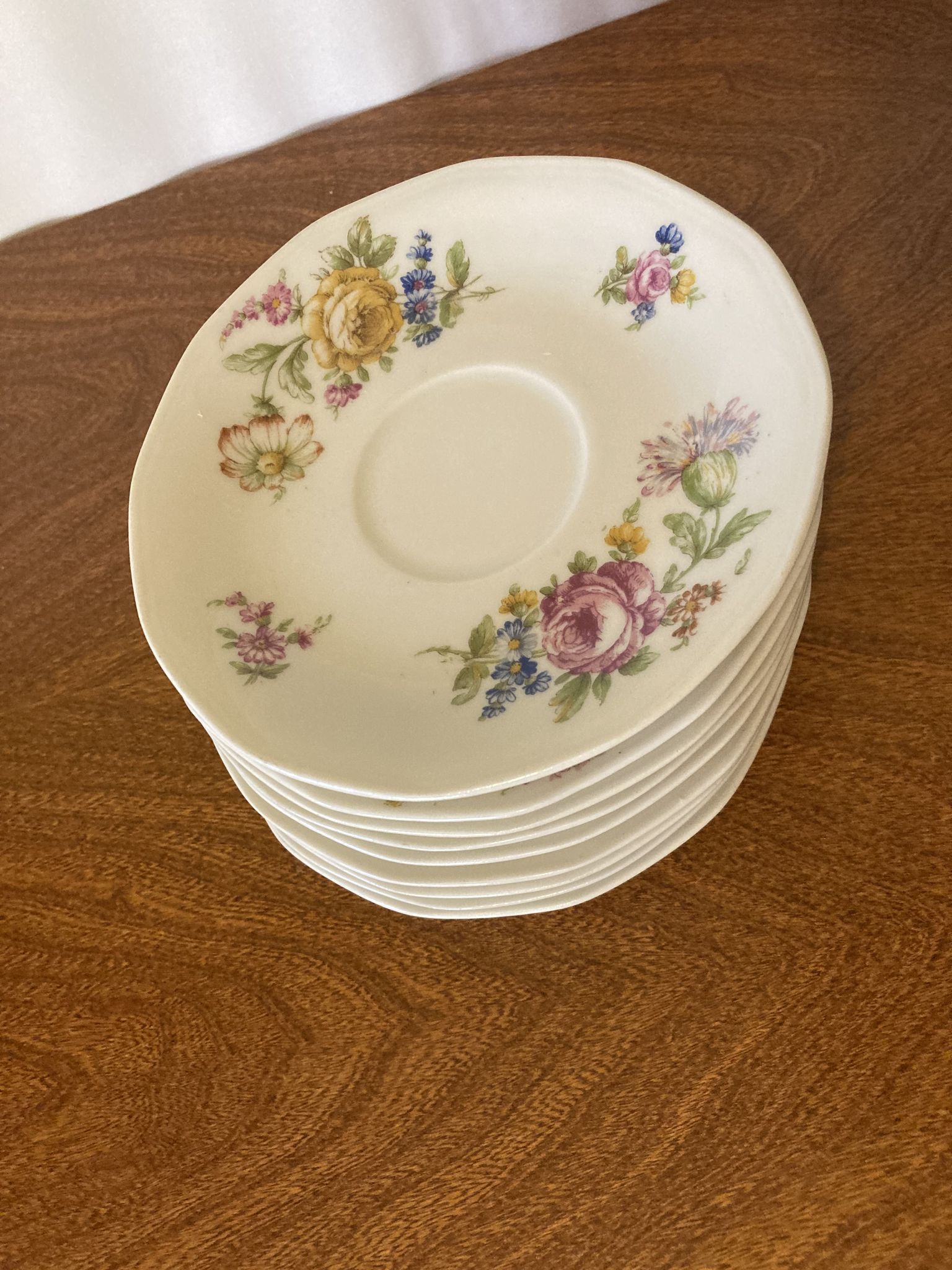 9 Limoges Haviland porcelain saucers or saucers with floral motifs.