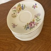 9 Limoges Haviland porcelain saucers or saucers with floral motifs.
