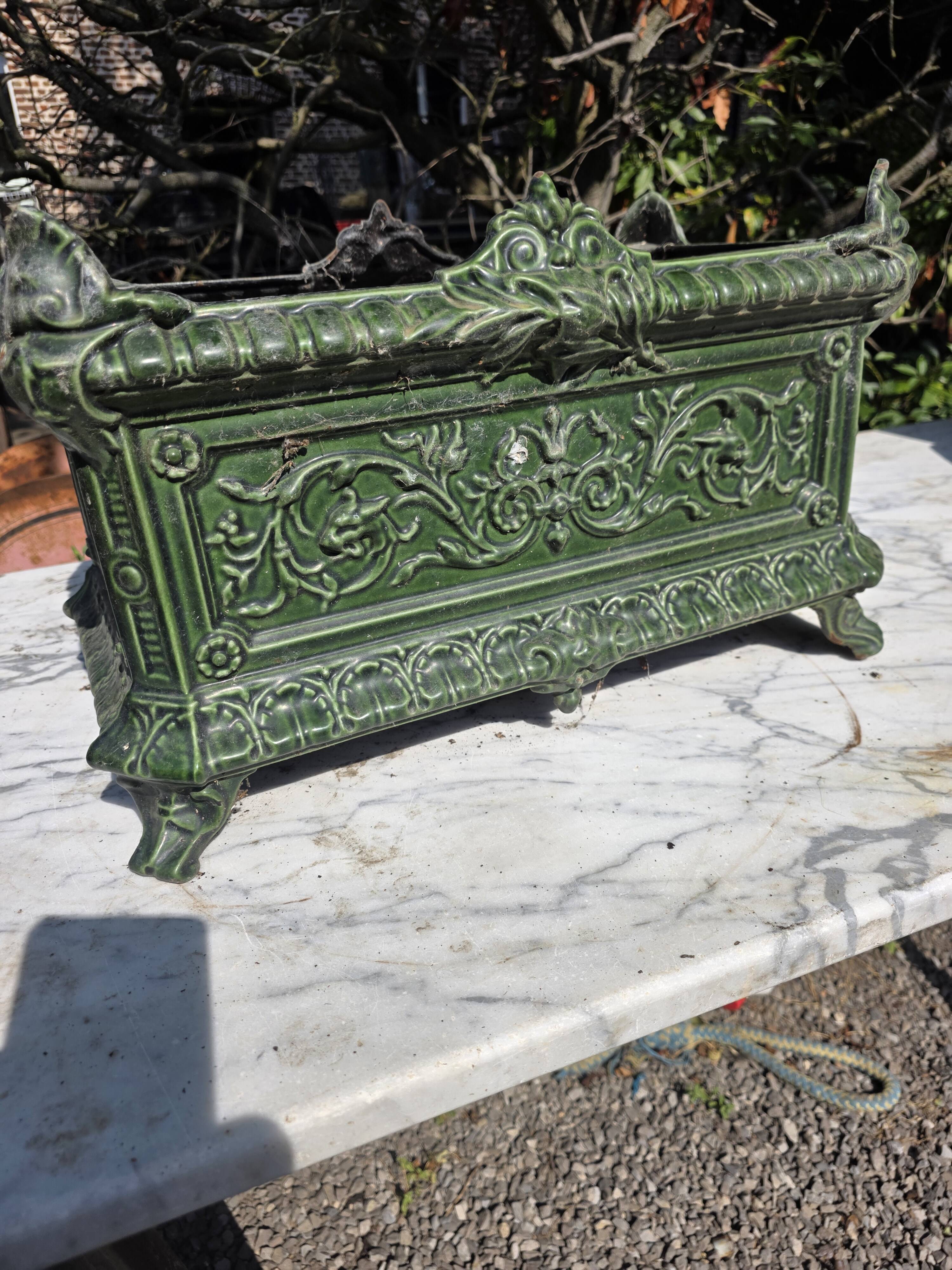 Antique enamelled cast iron planter in the Napoleon III style.