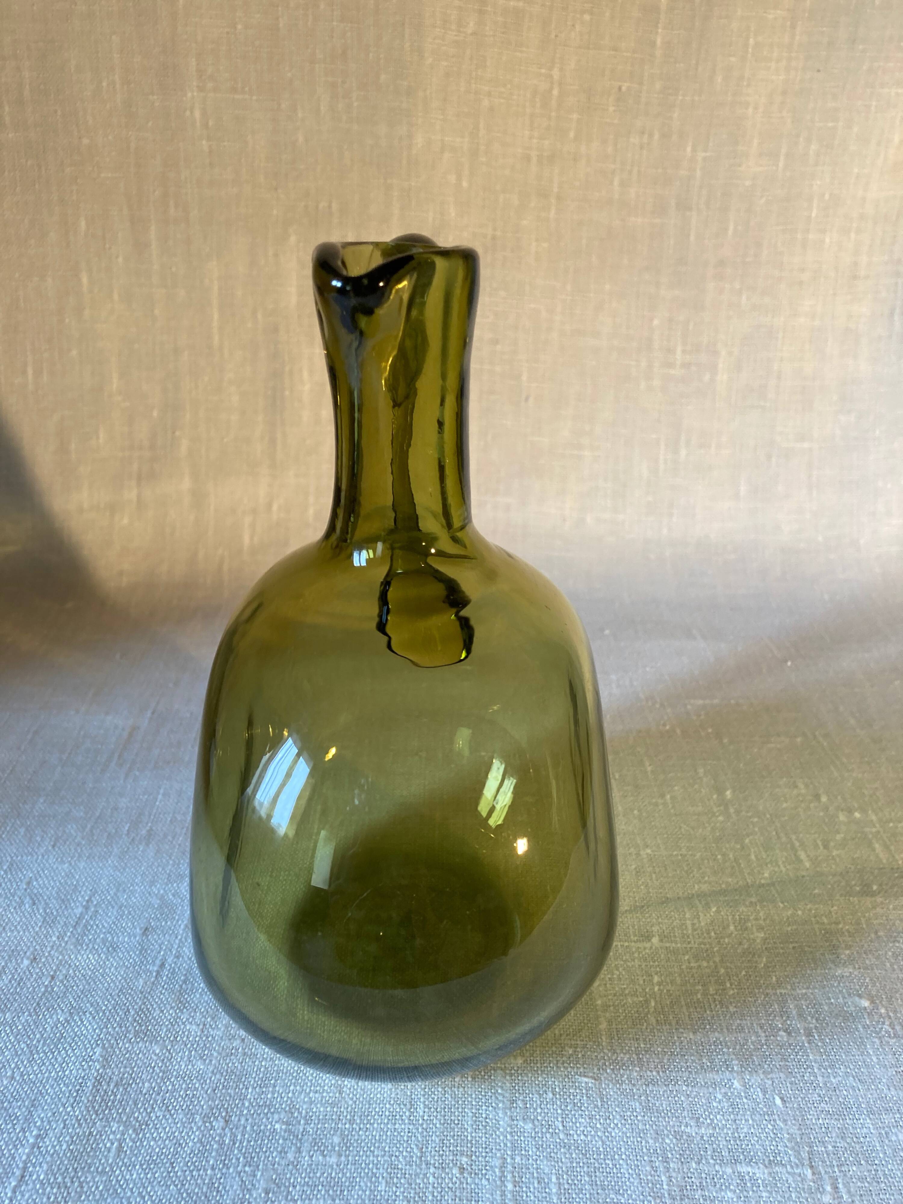 Green blown glass carafe