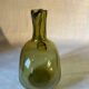 Green blown glass carafe