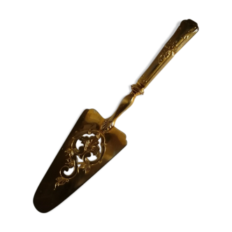 Old vintage gold metal cake pie shovel