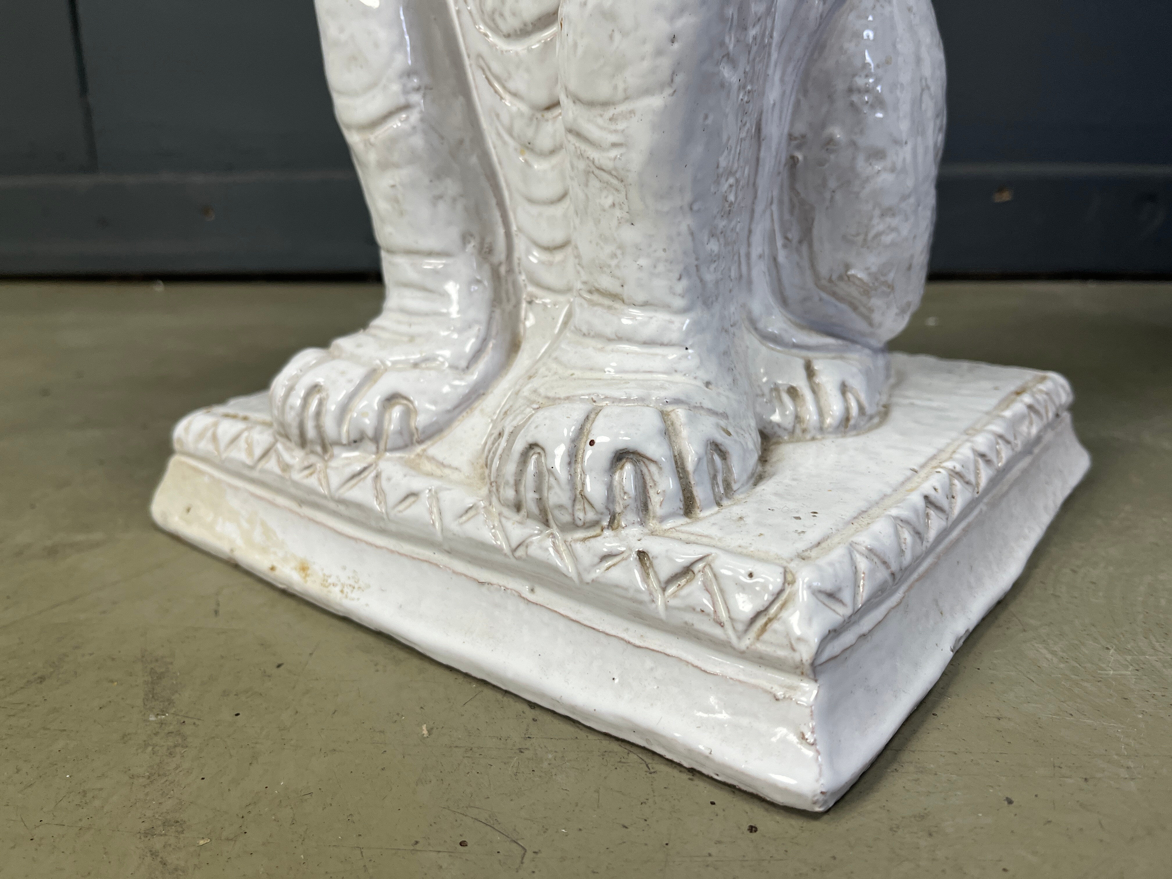 Pair of Renaissance style terracotta lion sculptures, 1950s