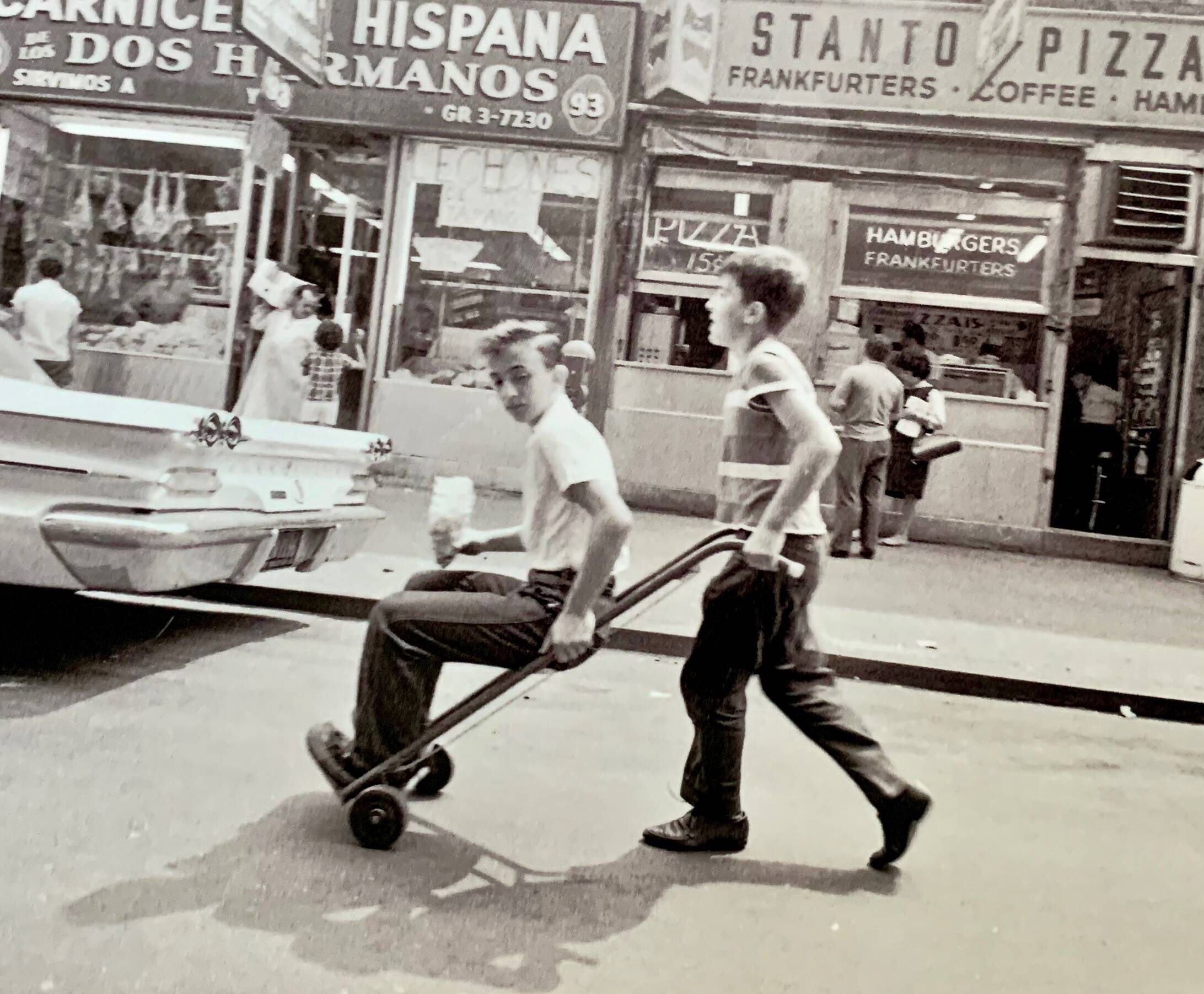 Little Italy – NYC 1964 A lively and spontaneous street scene.