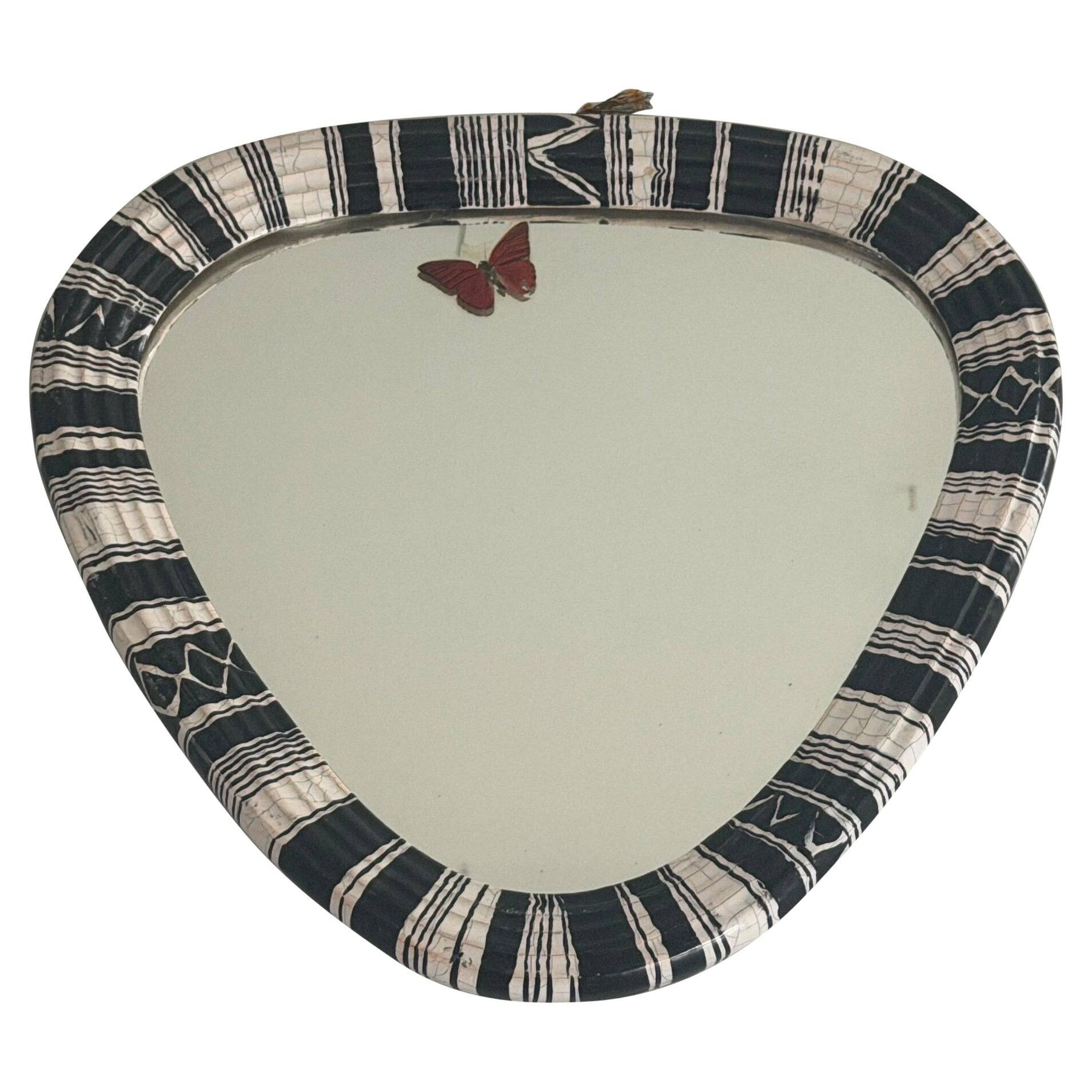 Small wall mirror, round triangle in black and white ceramic, 1950s, Germany.