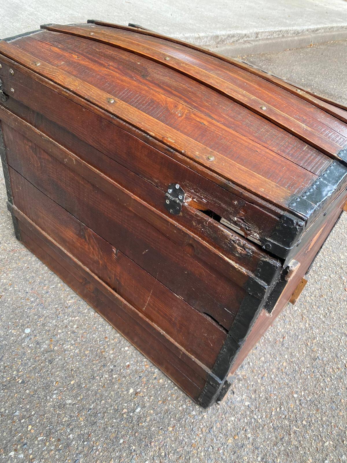 Vintage domed travel trunk from the 19th century.
