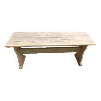 Patinated solid wood bench