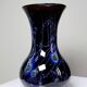 Large vintage purple art glass vase with silver glitter inclusions.