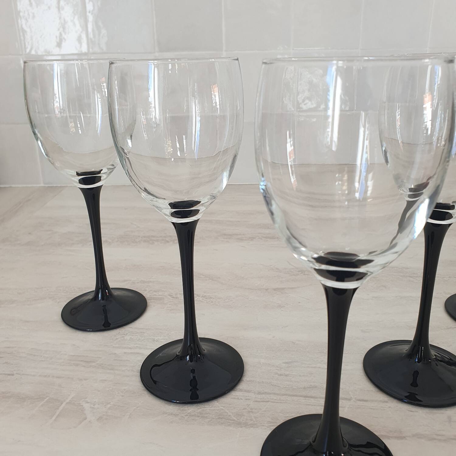 5 Luminarc black stem wine glasses