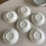 12 speckled ceramic plates.