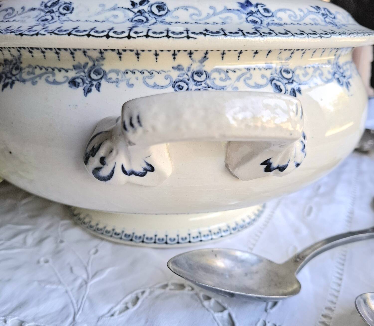 Antique mismatched earthenware soup plates with a tureen