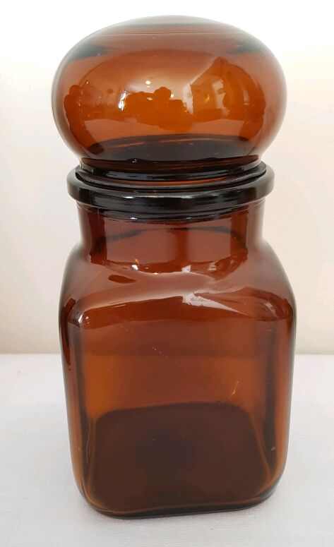 4  amber glass jars  70