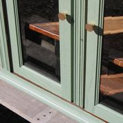 Renovated vintage sage green enfilade – wooden legs & bevelled display cabinets