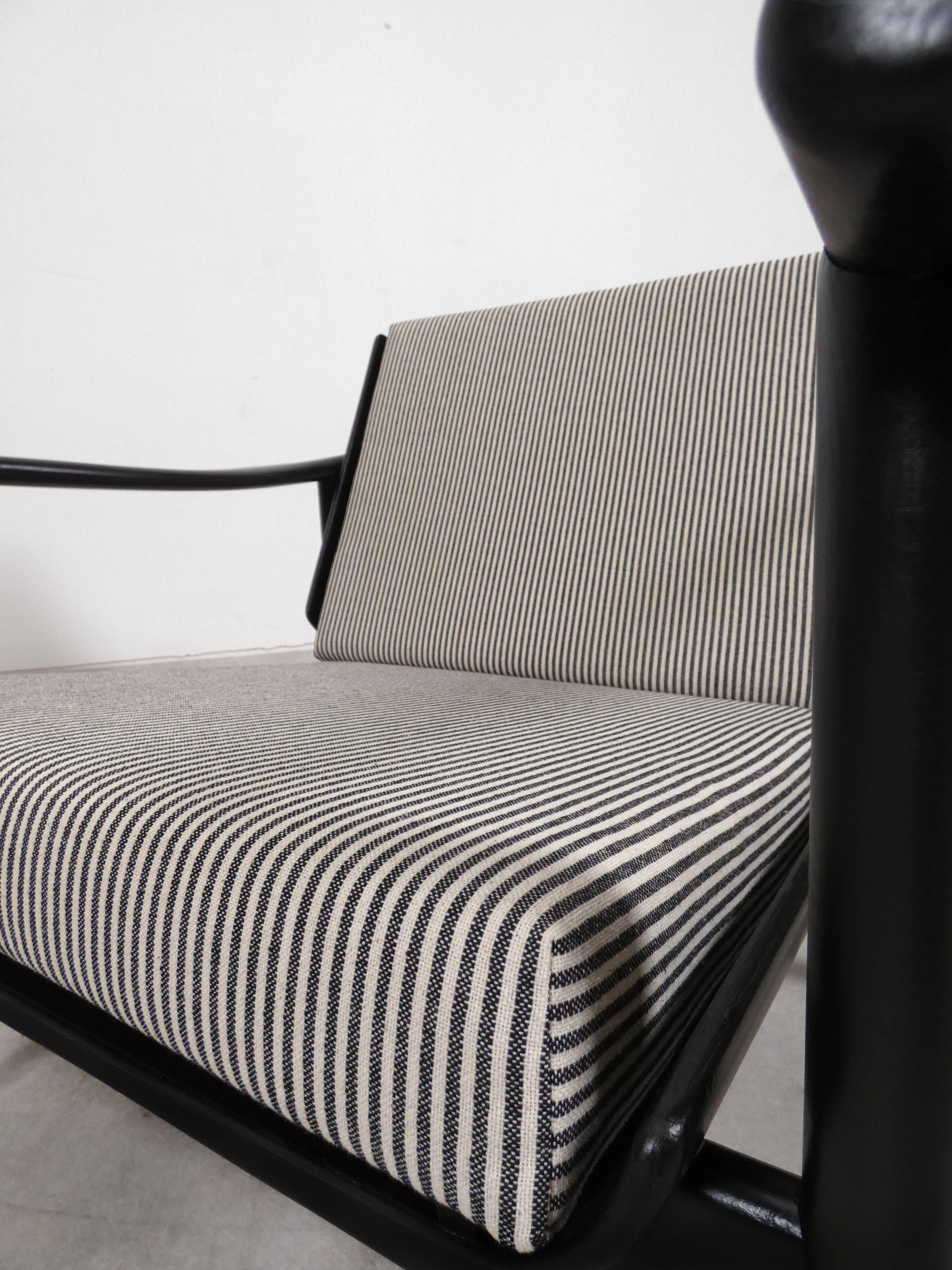 2x wooden Scandinavian arm chairs