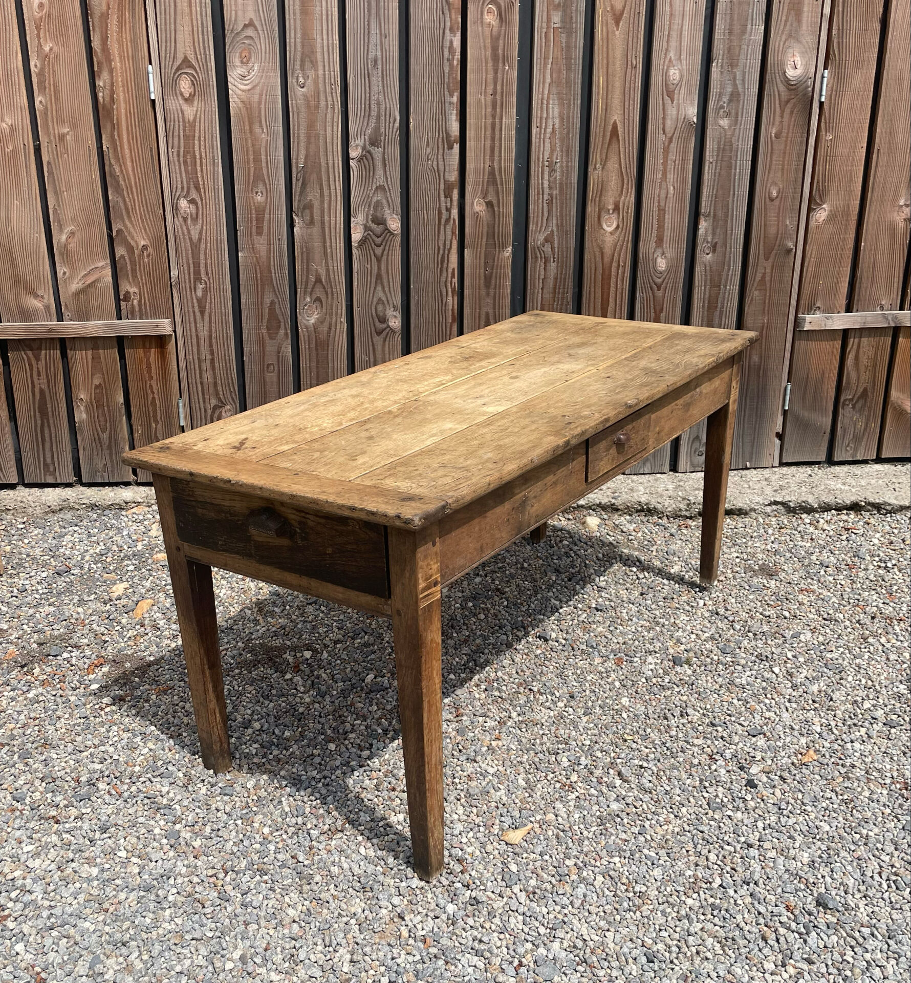 Solid oak farmhouse table with 2 drawers.