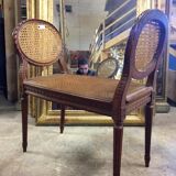 Banquette en cannage de style Louis XVI