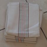 4 honeycomb tea towels. Scratches.