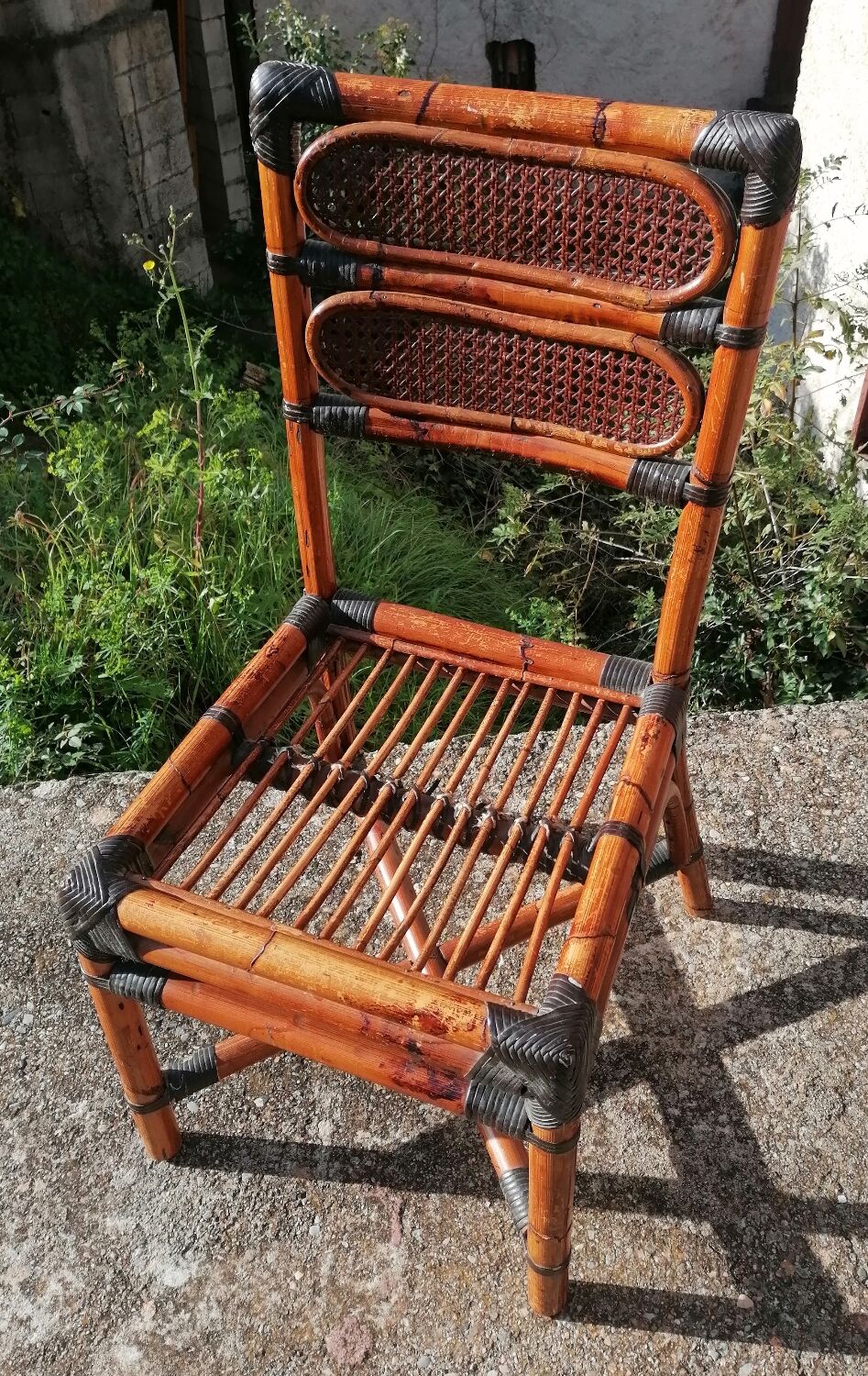 Vintage MacGuire chair in bamboo and canning